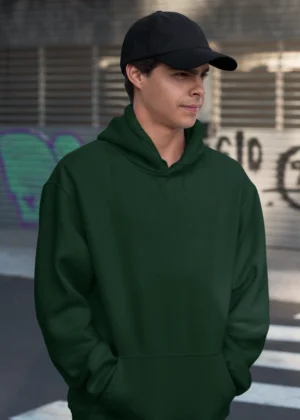 Male model in Bottle Green solid color hoodie, 300 GSM cotton fleece, Befiqr Style Solid but Stylish
