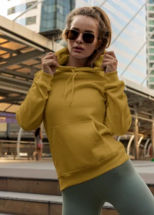 Female model in Mustard Yellow hoodie, Solid but Stylish 300 GSM cotton fleece by Befiqr Style